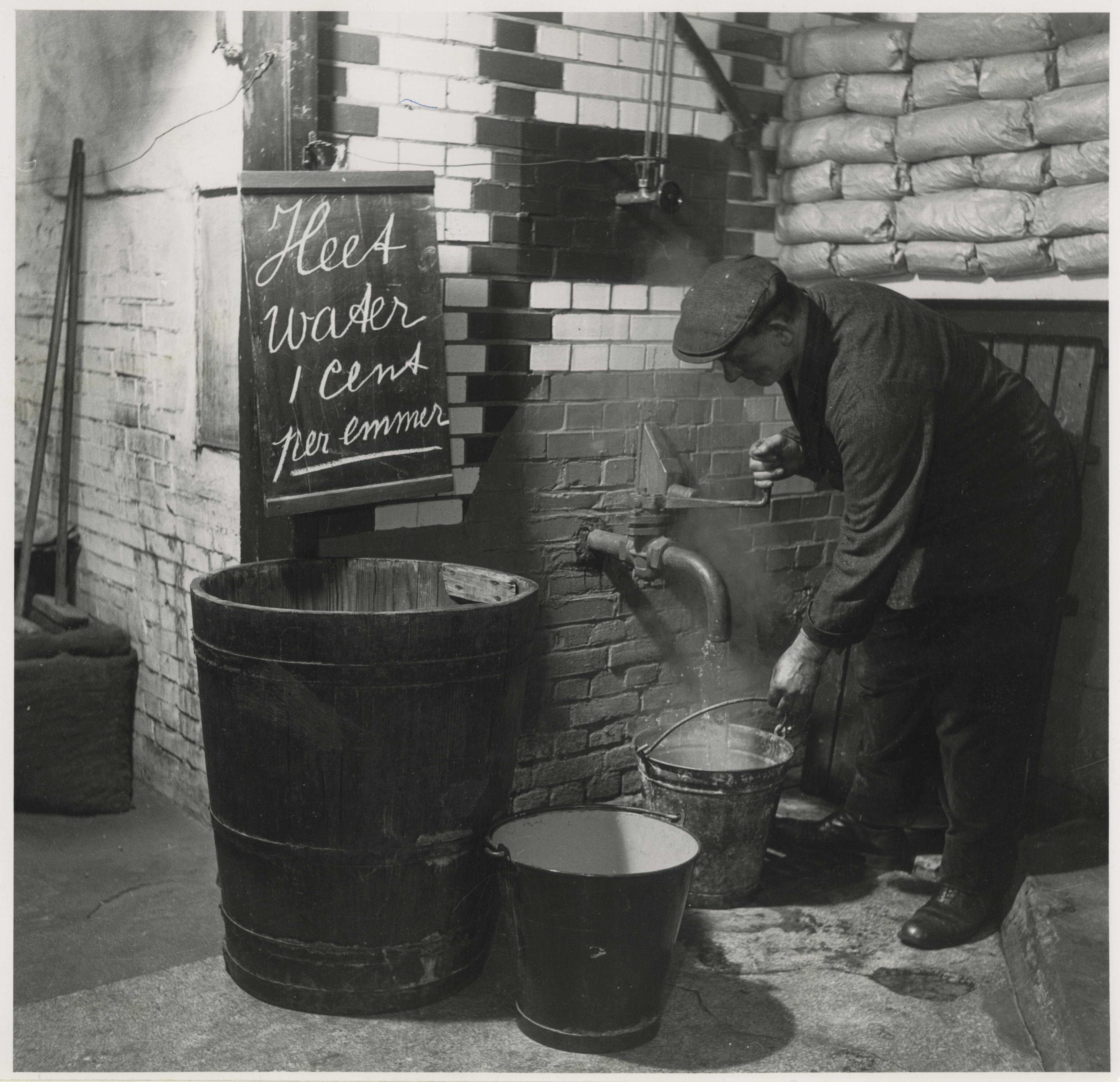 Waterstokerij in de Schilderswijk, maker onbekend, 1929